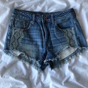 Blue jean shorts with design